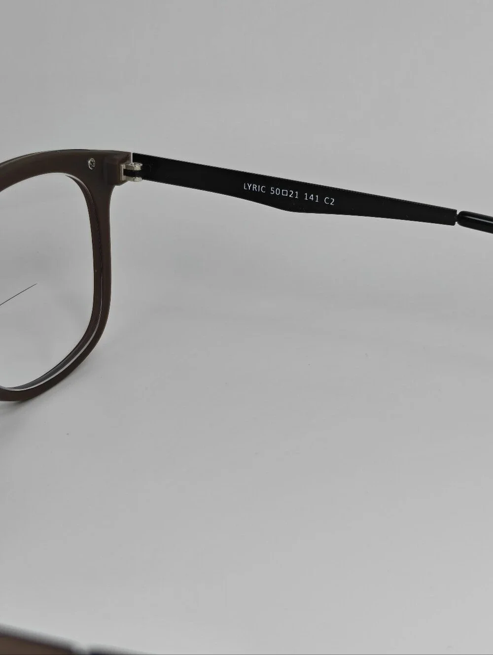 Lyric. Mocha Bronze Round Eyeglass Frames.
